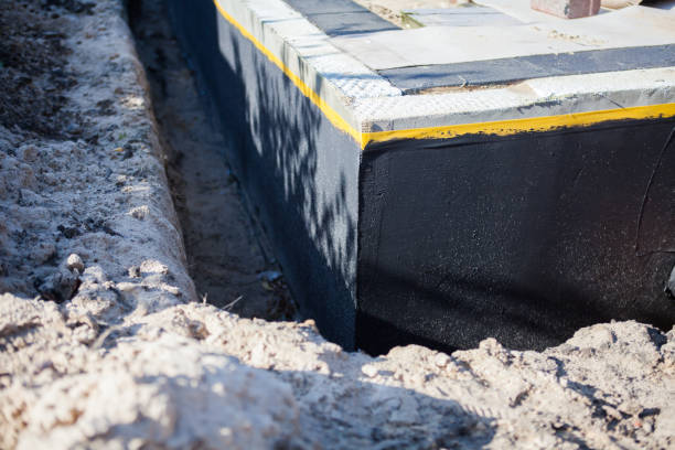Professional Interior Drainage System technician working in Glen Head, NY